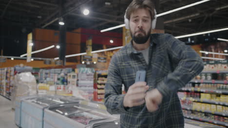man dancing in a grocery store