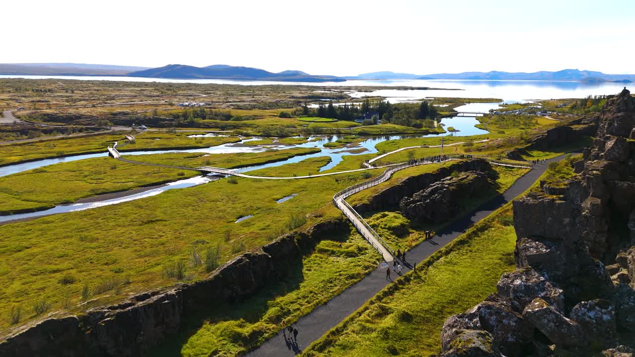 Drone shot with in the foreground, the lava rock to come revealed the Almannagj&aacute; fault, Thingvellir national park, Iceland