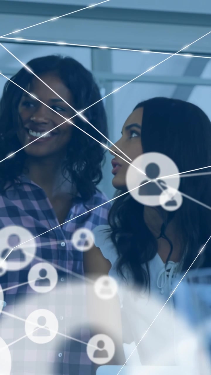 Vertical video: Business team tapping tablet, growing animated network linking group for project