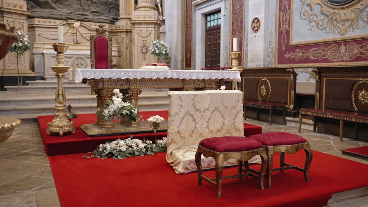 Luxurious altar with prayer bench and golden details at Sanctuary of Bom Jesus do Monte