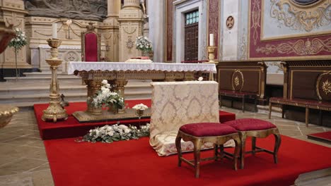 luxurious altar with prayer bench and golden details at sanctuary of bom jesus do monte