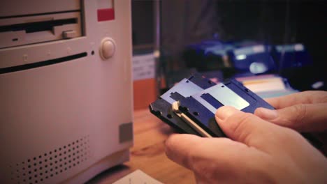 vintage computer with floppy disks