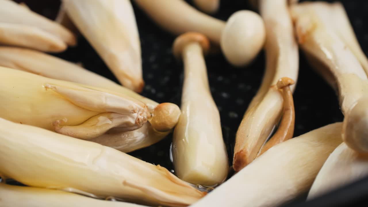 Frying White Mushrooms in a Pan