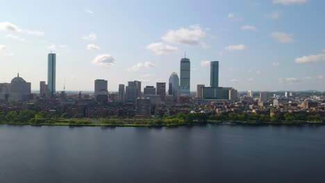 Cinematic-Aerial-Shot-Above-Charles-River,-Boston's-Back-Bay-in-Background