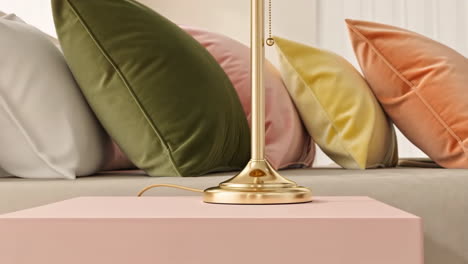 elegant gold lamp and velvet pillows in a modern interior