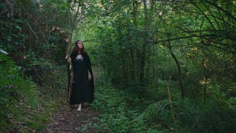 young-druid-girl-walking-in-a-forest-dolly-very-long-shot