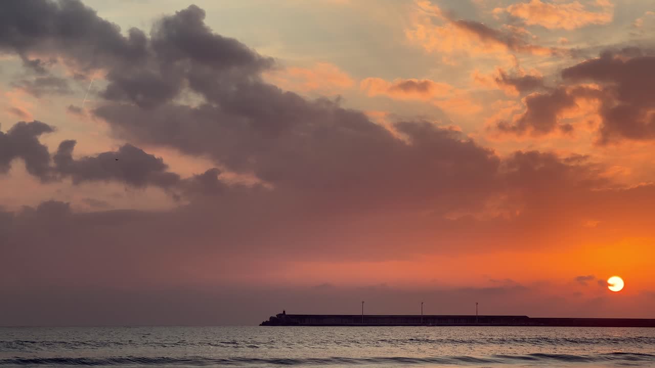 Sunrise over the Ocean with Pier