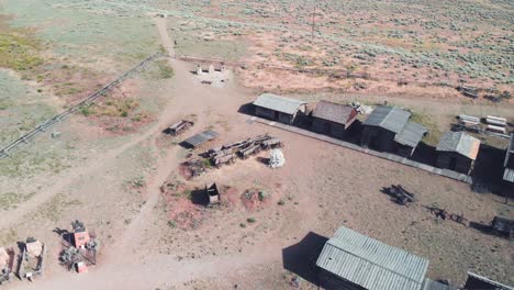 slow aerial pan over the old trail town western scene in northern wyoming during the summer