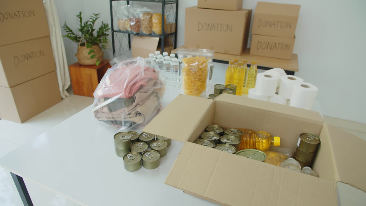Donation Box with Food in Charity Organization Office
