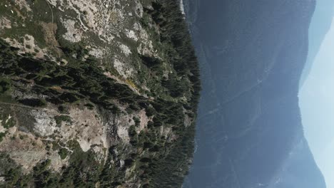 vertical video of trails on goat ridge top with howe sound valley in background