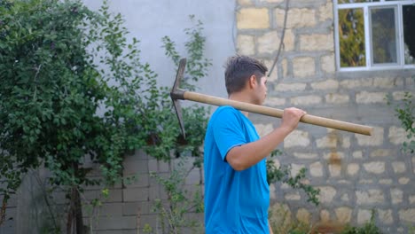 digging field young farmer