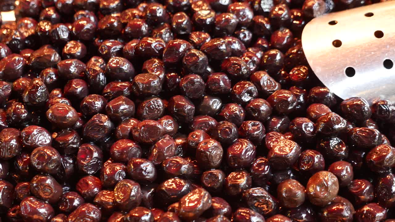 Close up of black olives at a market