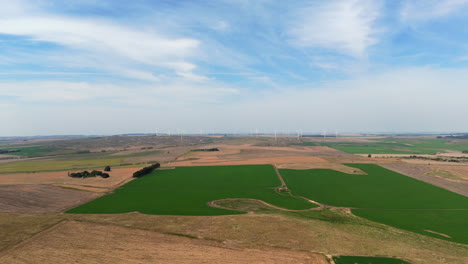 aerial view of a wind farm in a rural landscape