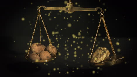 animation of gold and walnuts on scales and glowing spots floating on black background