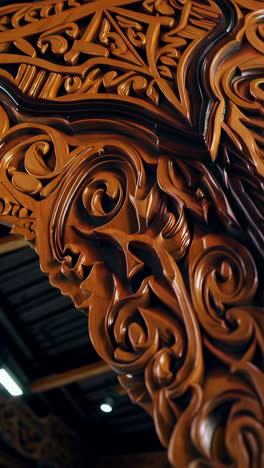hockey player in front of ornate wooden carvings