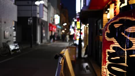 a quiet walk down a vibrant, illuminated urban alley.