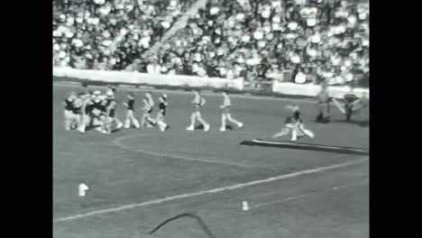 group of people enjoying a sport games. circa ussr 1970: group of people enjoying a sport games