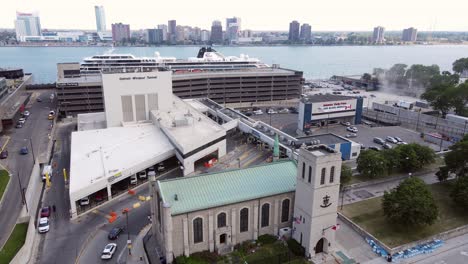 Mariners&#039; Church in front of the Detroit-Windsor Tunnel, aerial ascend view