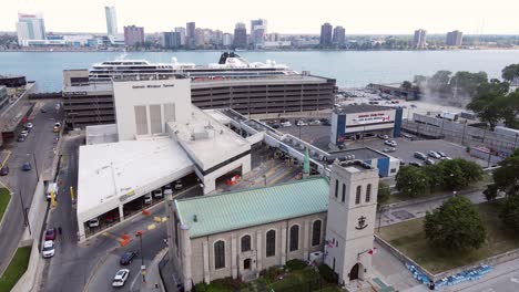 mariners' church in front of the detroit-windsor tunnel, aerial ascend view