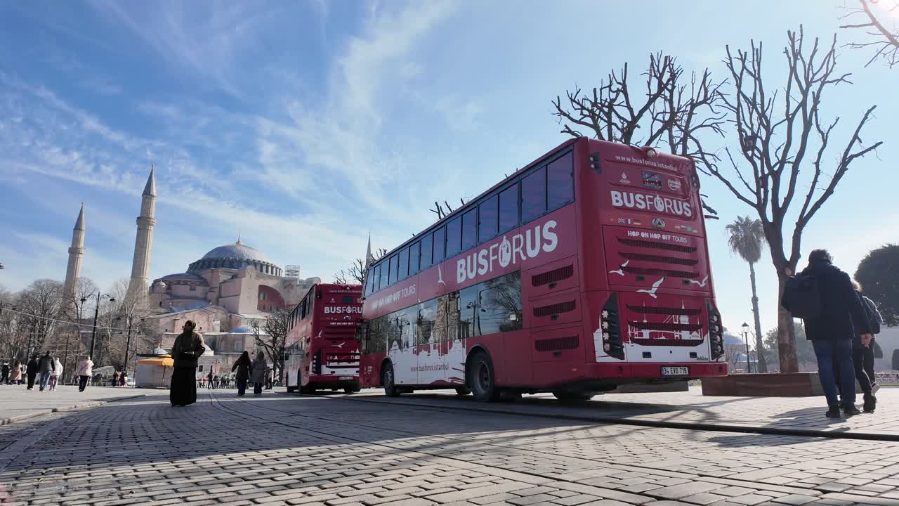 Red Busforus Tour Buses in front of Hagia Sophia, Istanbul