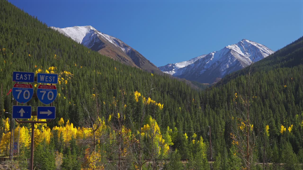 Torreys Peak and Grays Peak fourteener 14er Colorado i70 interstate 70 sign Fall Autumn blue sky morning afternoon snow covered Front Range Rocky Mountains Continental Divide Silverplume Silverthorne