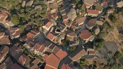 monsanto castle ruins and village at sunset, portugal