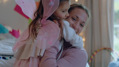 happy little girl hugging mother enjoying loving mom embracing daughter at home 4k footage