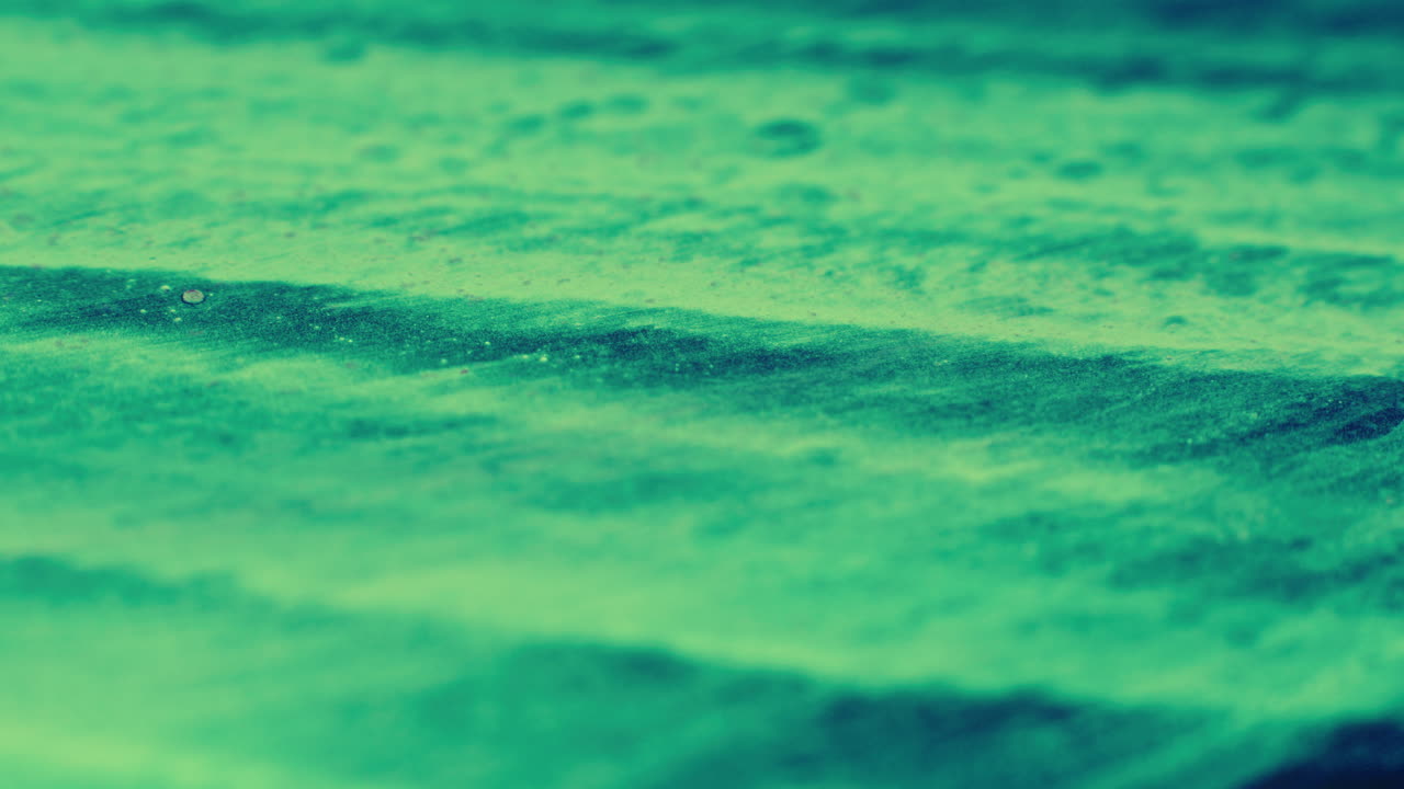 Colourful, organic, liquids macro shots buzzing and flowing