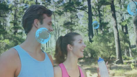 animation of babbles over caucasian couple drinking water