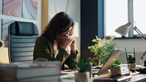 focused businesswoman communicating online conference worried by work close up.