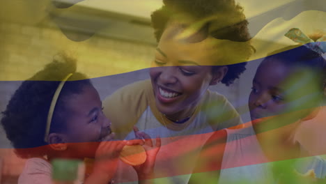 animación de la bandera de colombia sobre una madre afroamericana con hijos