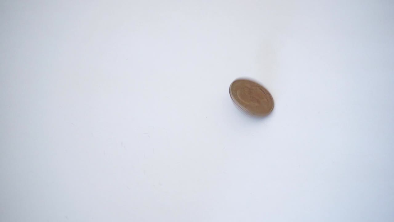 moneda de un cuarto de giro en cámara lenta