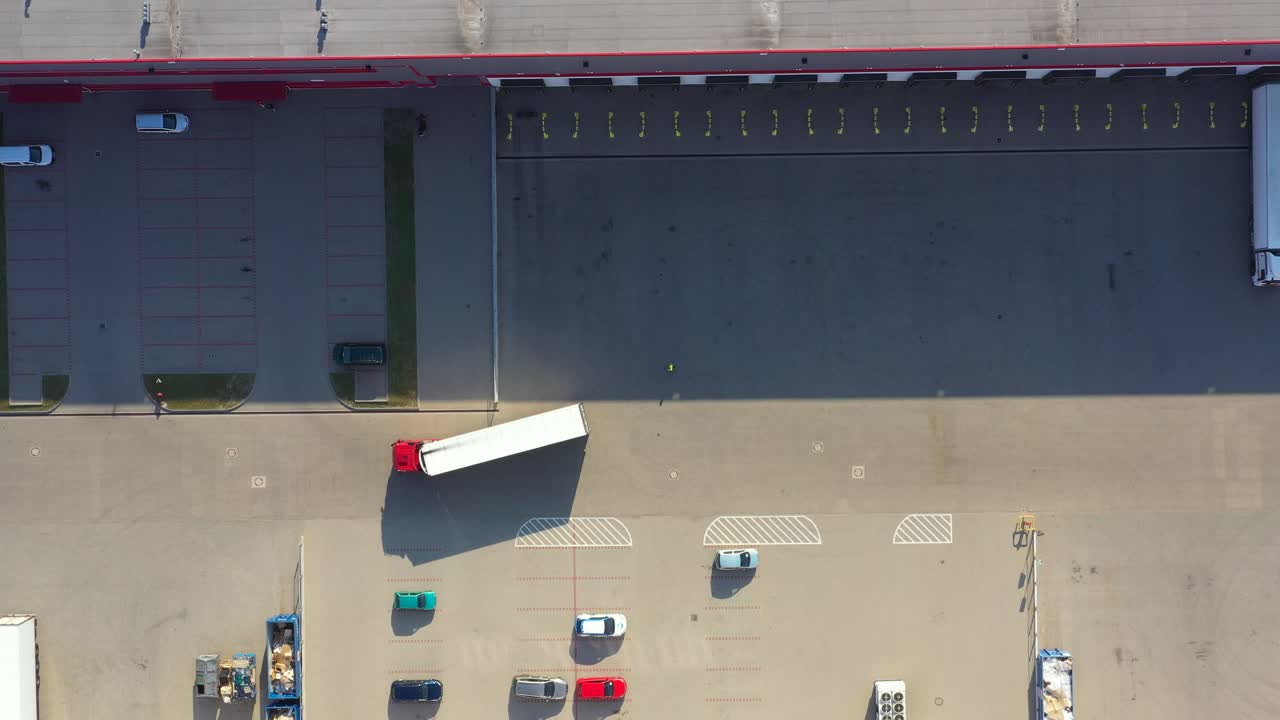 Aerial View of Cargo Containers and Distribution Warehouse