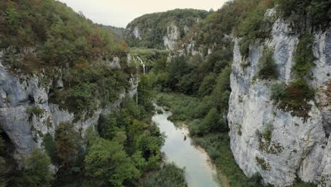 lush rocky river canyon with cascading waterfalls, plitvice, croatia