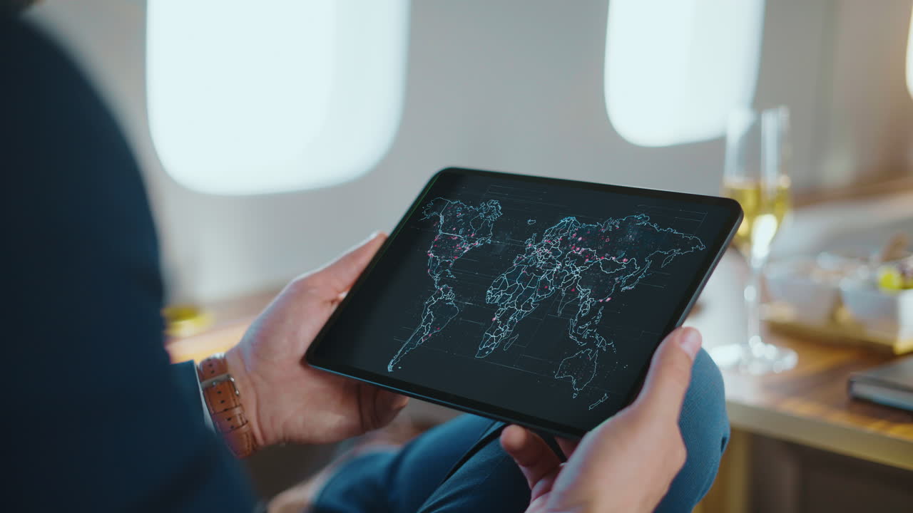 World Map on Tablet in Private Jet