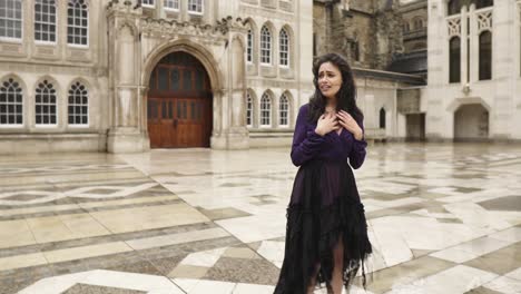 heartbroken depressed alone indian young woman in gothic outfit near church lost no people empty street slowmotion