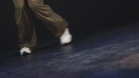 modern contemporary dance feet close up moving fast hip hop music rhythm on stage