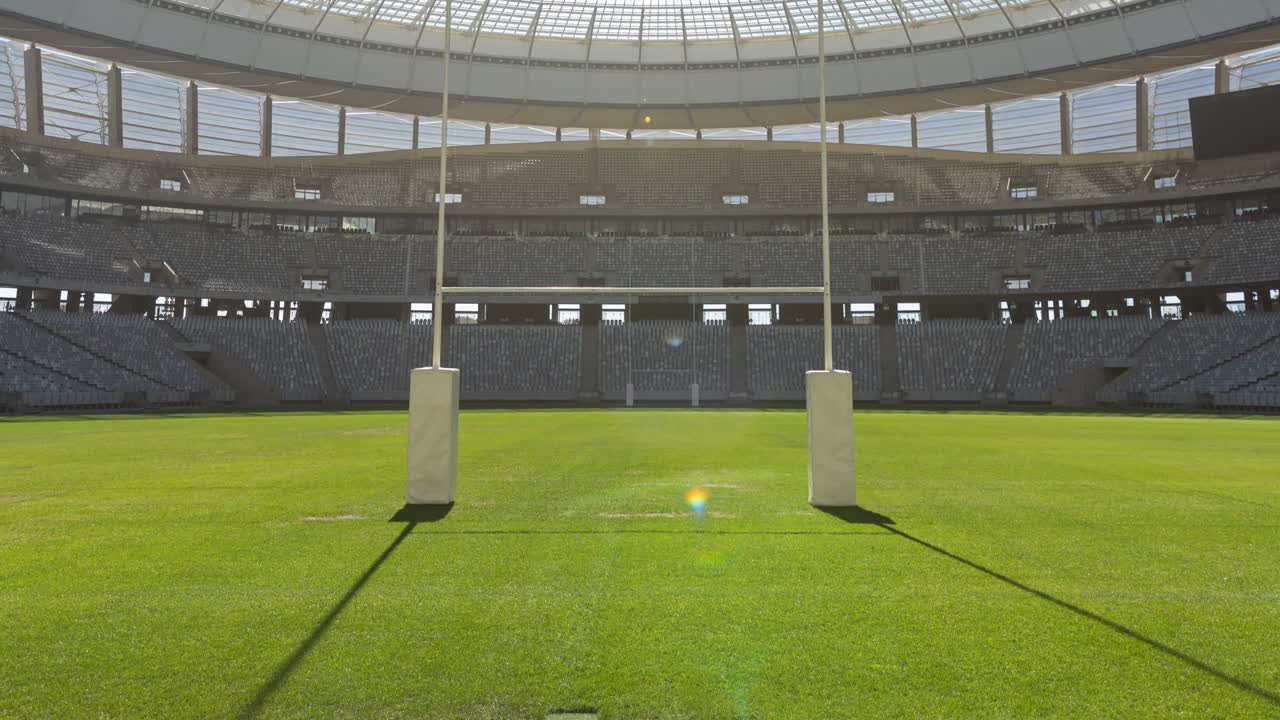 スポーツスタジアムのラグビーピッチで空のスタンドのアニメーション