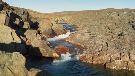 small waterfall in the canadian tundra