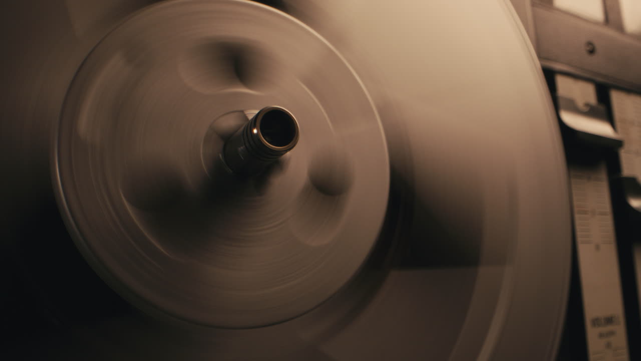 A vintage tape recorder in a blinking light