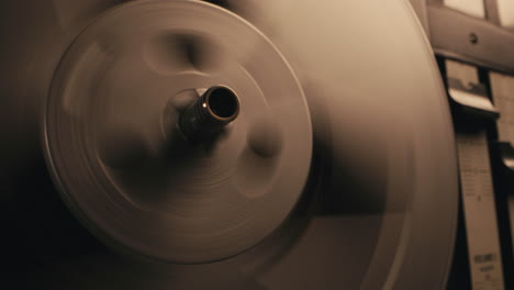 a vintage tape recorder in a blinking light