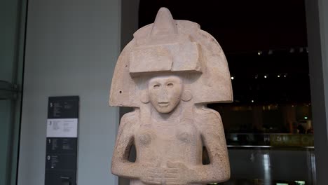 stone statue displayed in museum exhibit