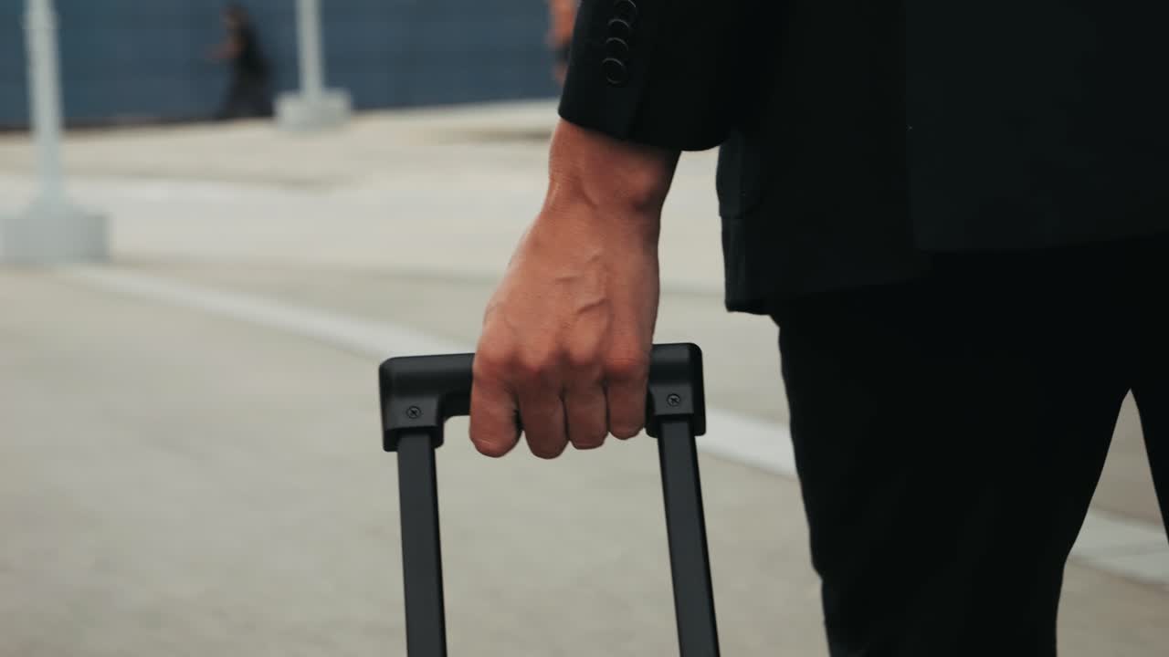 Tourist man with suitcase baggage in spain, A traveler with luggage suit jacket on business street go to a hotel, business office, airport terminal, enjoying the vibrant atmosphere