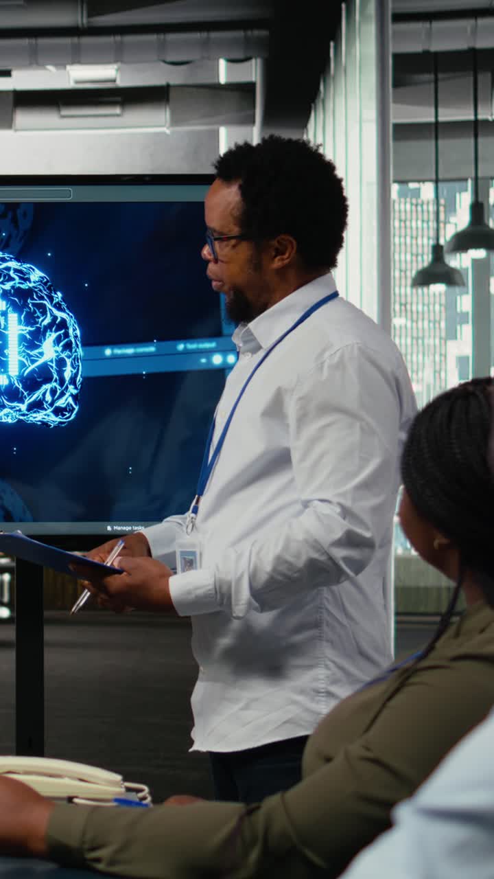 Vertical video CTO in startup office doing presentation on deep learning tech to investors