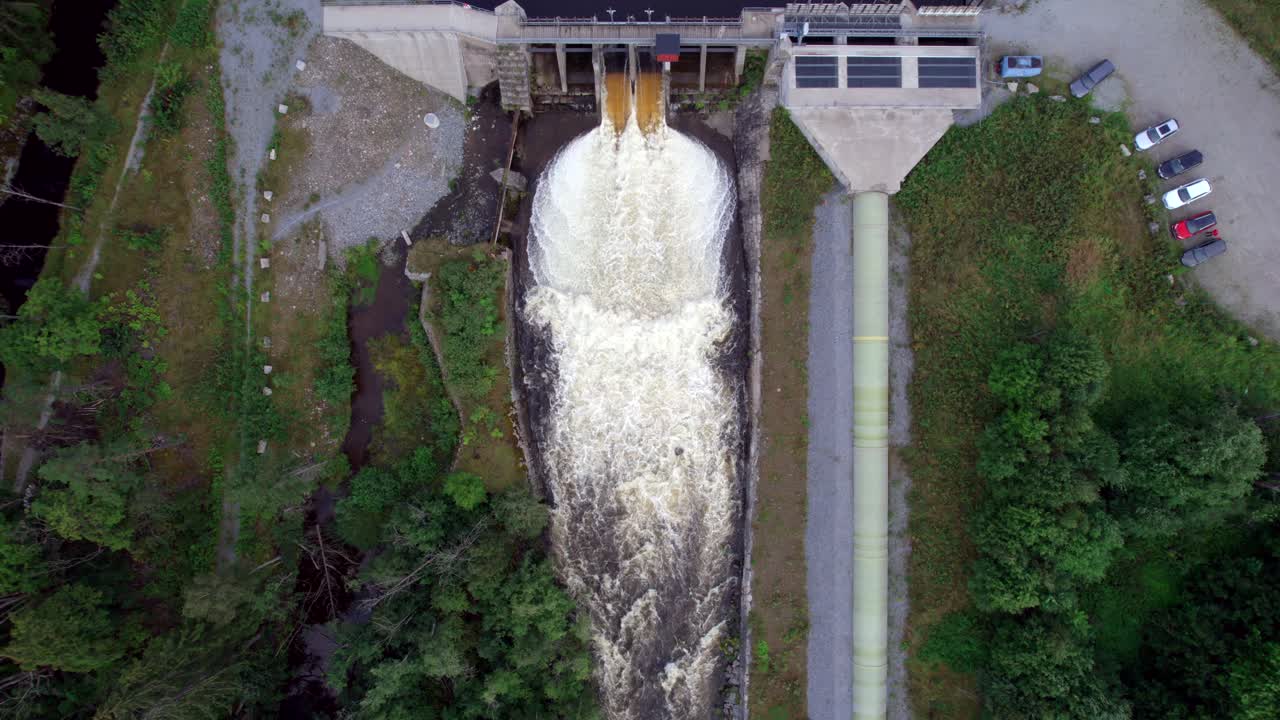 Top Down Aerial Hydroelectric Power Dam, Flowing Water, Aerial Descending
