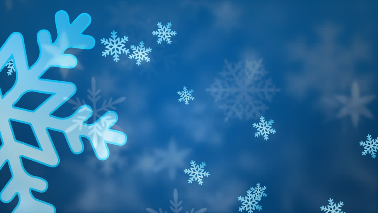 Animazione di fiocchi di neve che cadono su sfondo blu.