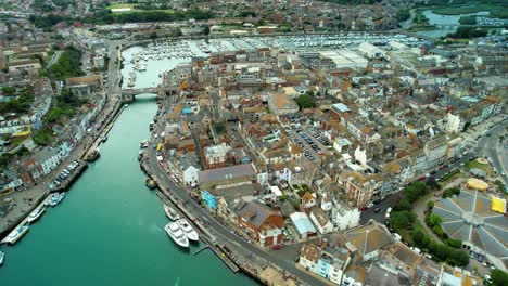 aerial view of the dorset town of weymouth concentrating on the town centre and harbour area - drone shot