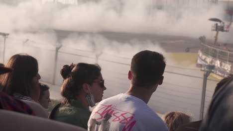 spectators watching a drifting event