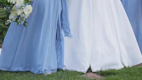 bride walks with bridal party