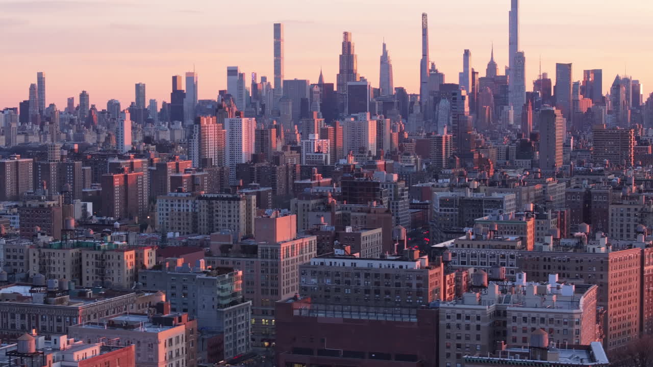 Aerial view of the New York City skyline at dusk. Shot in Harlem looking south towards Midtown Manhattan.